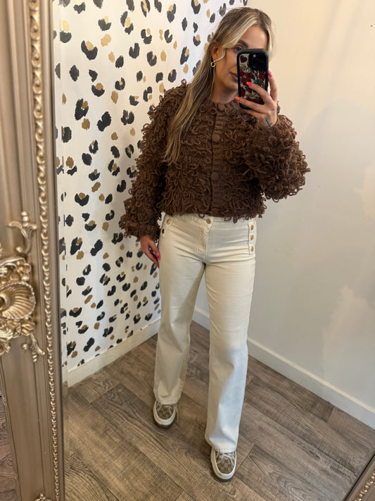 Gold button detail cream jeans