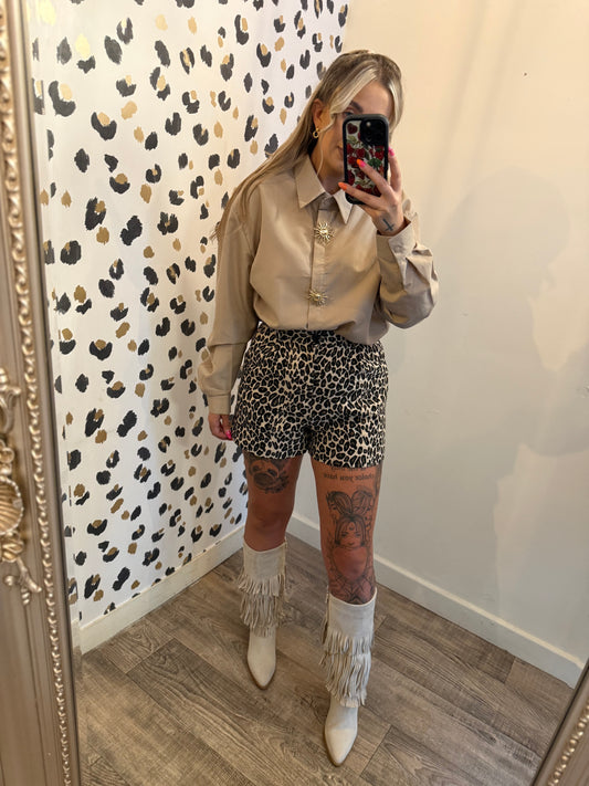 Beige shirt with gold sun button detail